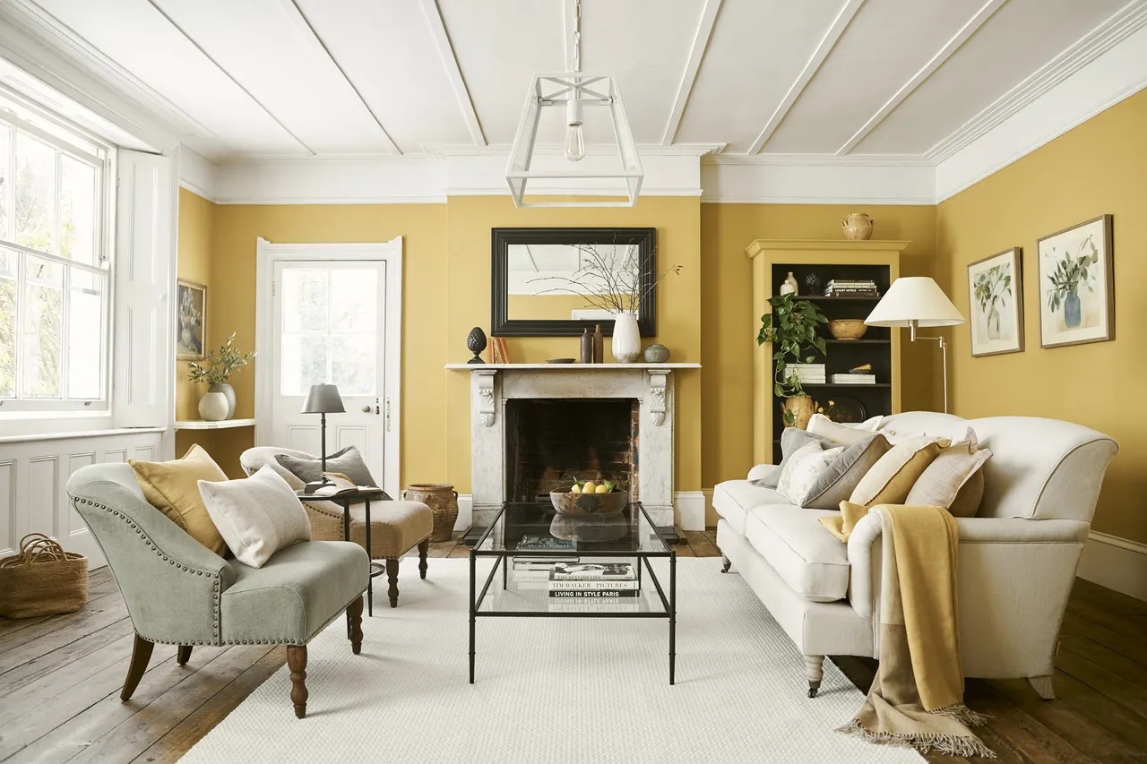 Living room with soft yellow colour combination 