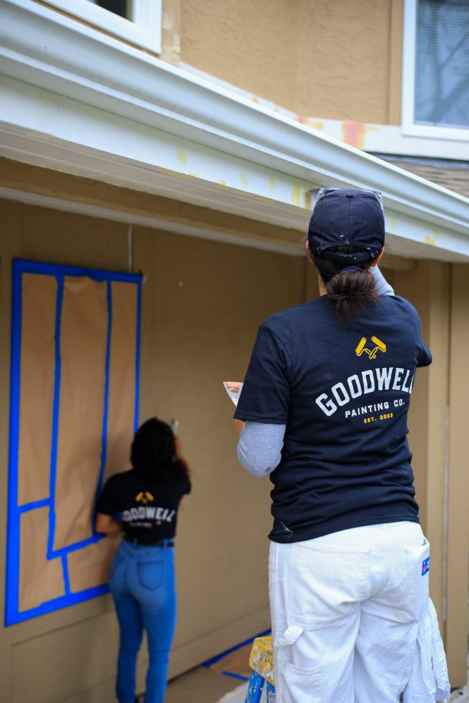 Goodwell painters masking and prepping an exterior before painting