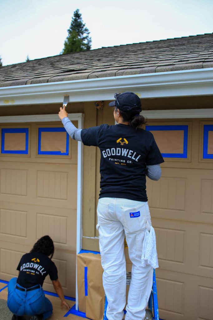 Goodwell painters prepping and painting exterior trim