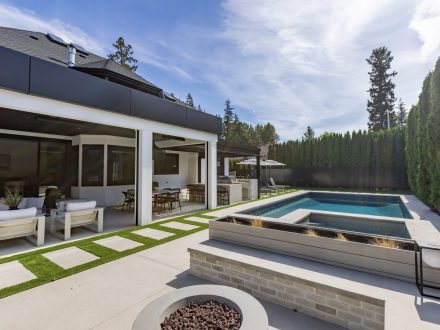 A home exterior with a pool in Tsawwassen
