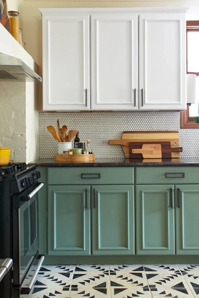 Green painted lower cabinets with white uppers